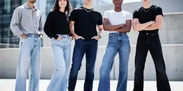 Fashion models displaying 2026 denim cuts, urban background